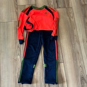 Two piece matching adidas dri-fit outfit.
